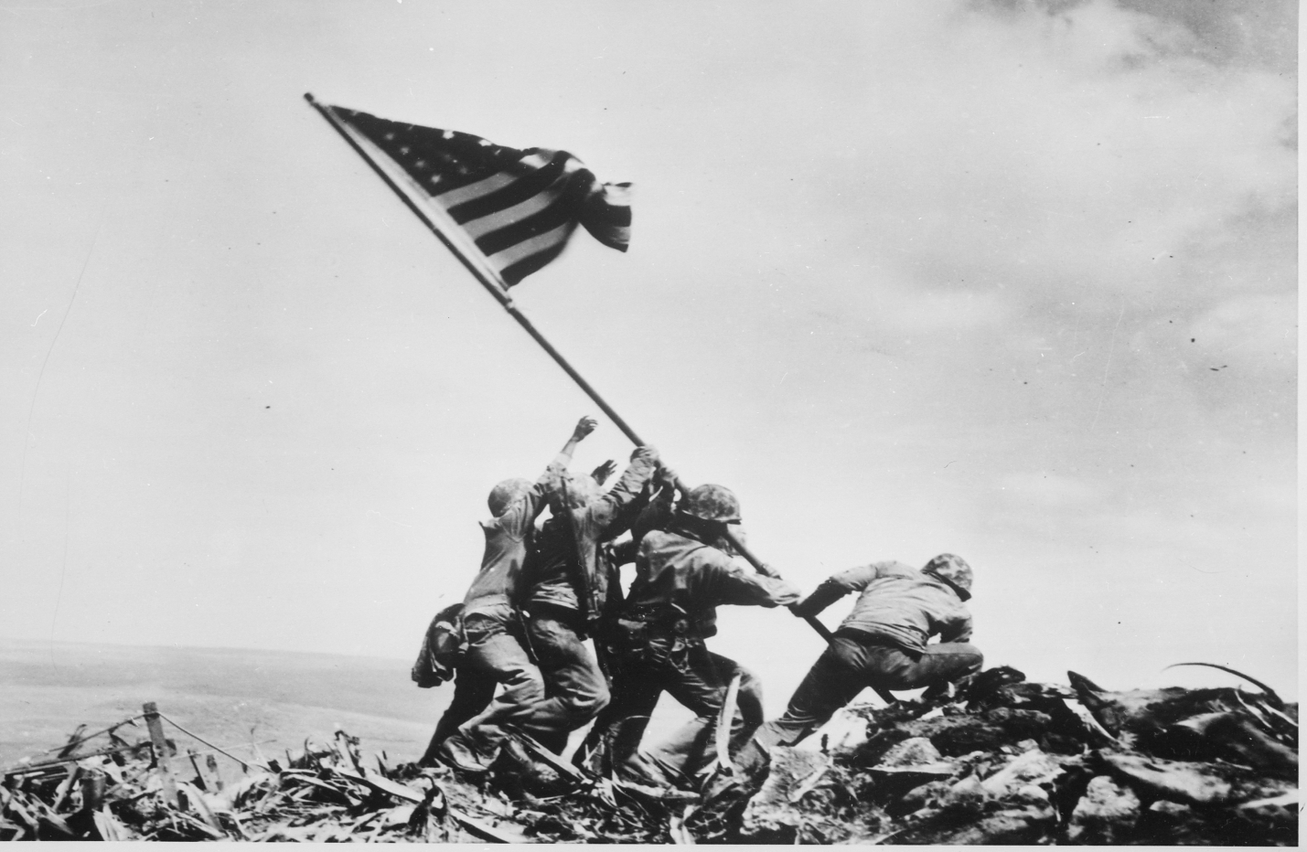 Marines raising the U.S. flag on Iwo Jima as a symbol of victory 